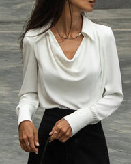 Elegant långärmad blus med knäppning