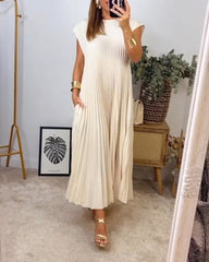 Ärmlös plisserad chic till perfektion